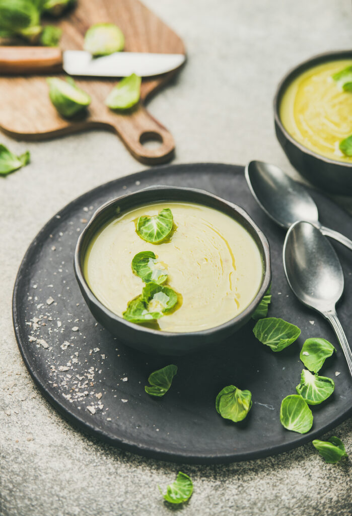 brussels-sprouts-vegetable-cream-soup-in-dark-bowl-2021-08-26-16-17-53-utc-699x1024.jpg